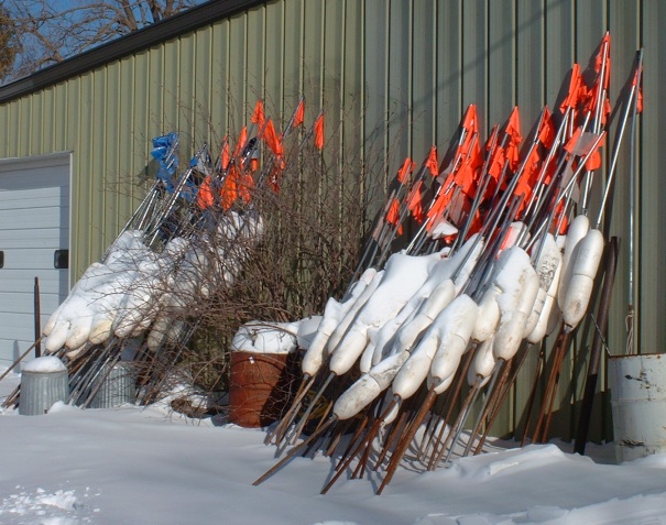 Commercial fishing gear propped up against the wall, waiting for spring